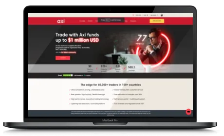 Axi website displayed on a Macbook