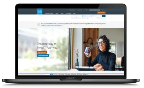 Charles Schwab website displayed on a Macbook